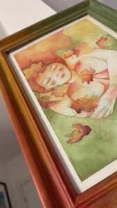 Romantico acquerello su carta con atmosfera da sogno e colori caldi con pennellate trasparenti che richiamano l’autunno, cornice personalizzata con colori che richiamano l’autunno