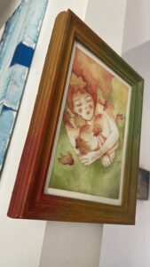 Romantico acquerello su carta con atmosfera da sogno e colori caldi con pennellate trasparenti che richiamano l’autunno, cornice personalizzata con colori che richiamano l’autunno
